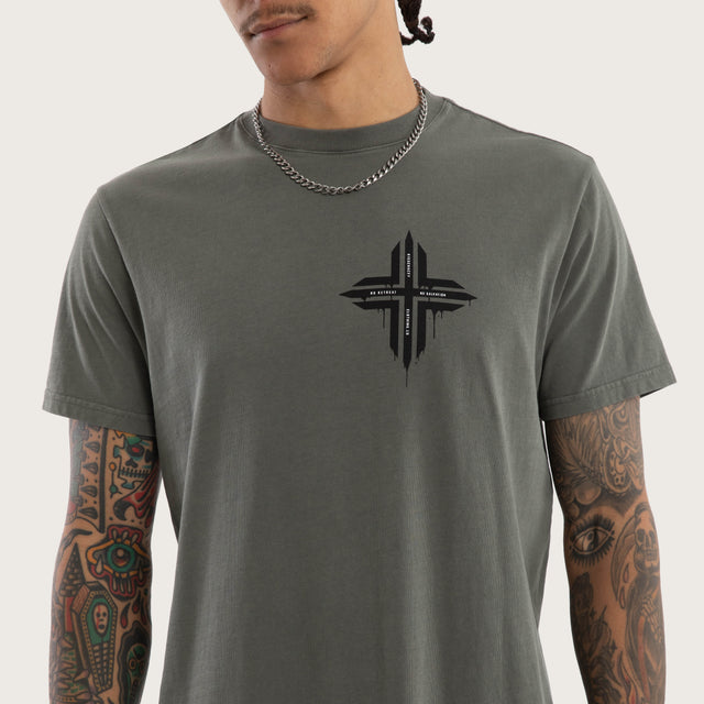 Model wears Preservation Curved Hem Tee in Green T-Shirts in Green - Image 3