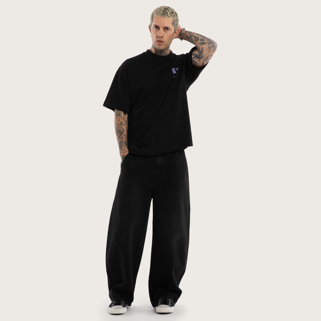 Model wears Mamba Box Fit Tee Black T-Shirts in Black - Image 2