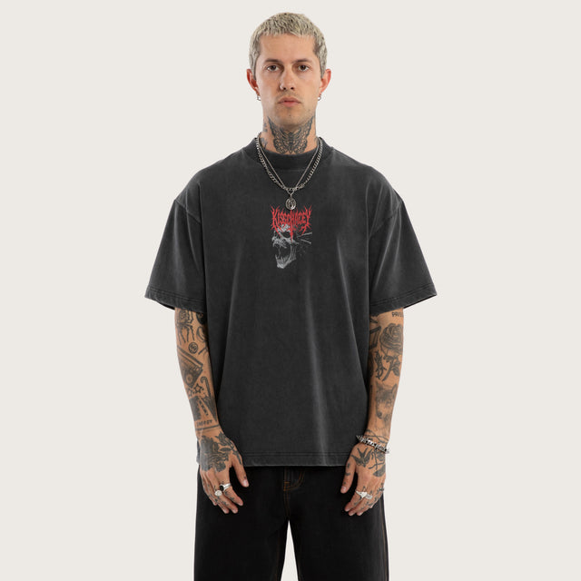 Model wears Mythic Box Fit Tee Snow Black T-Shirts in Black - Image 2