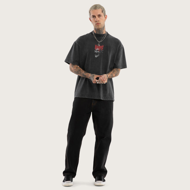 Model wears Mythic Box Fit Tee Snow Black T-Shirts in Black - Image 3