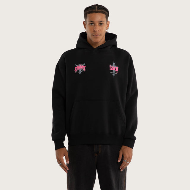 Model wears Glitch Oversized Hoodie Jet Black Hoodies in Black - Image 1