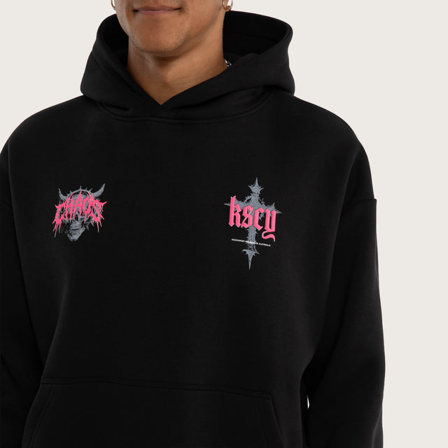 Model wears Glitch Oversized Hoodie Jet Black Hoodies in Black - Image 5