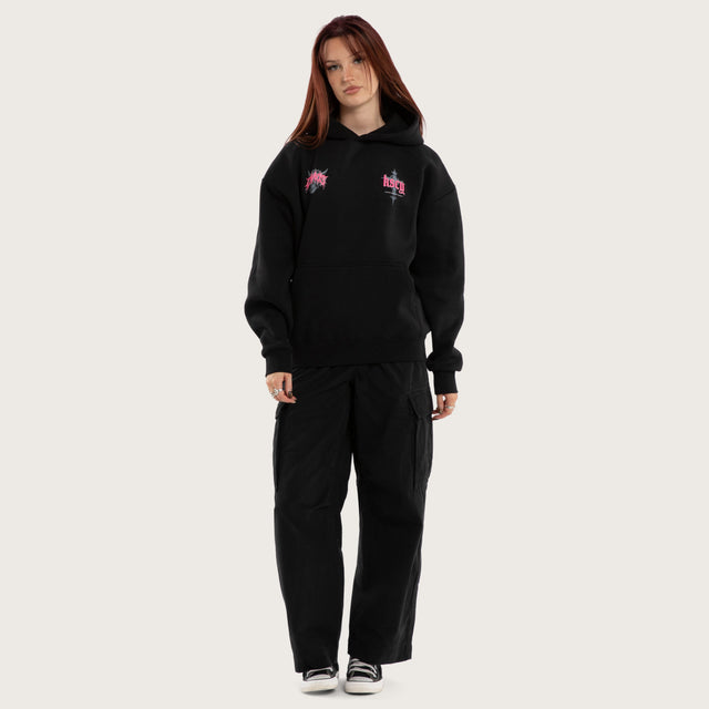 Model wears Glitch Oversized Hoodie Jet Black Hoodies in Black - Image 12