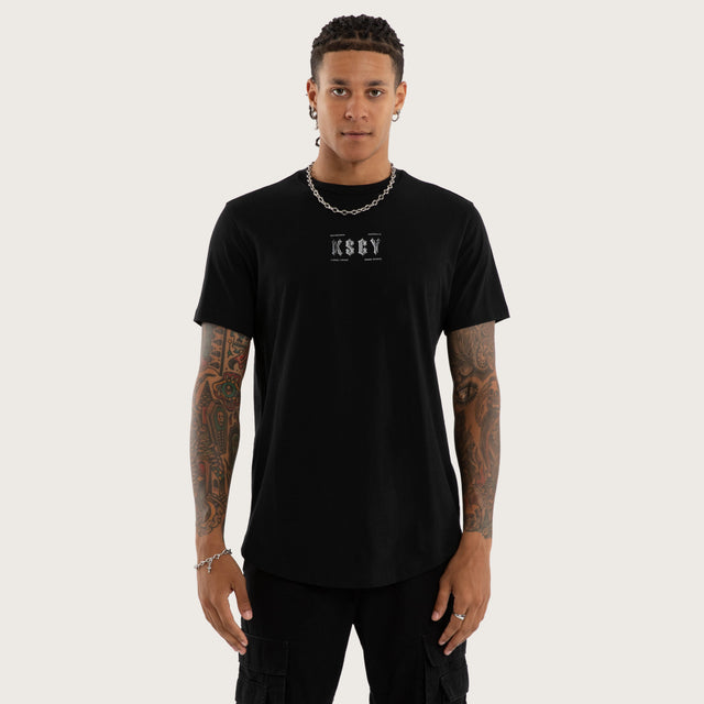 Model wears Encryption Curved Hem Tee Jet Black T-Shirts in Black - Image 1
