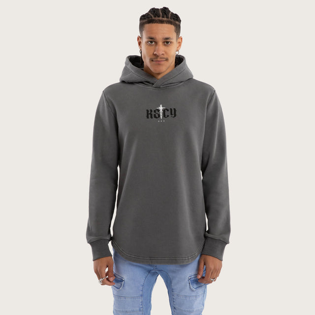 Model wears Existence Dual Curved Hoodie Pigment Charcoal Hoodies in Grey - Image 1
