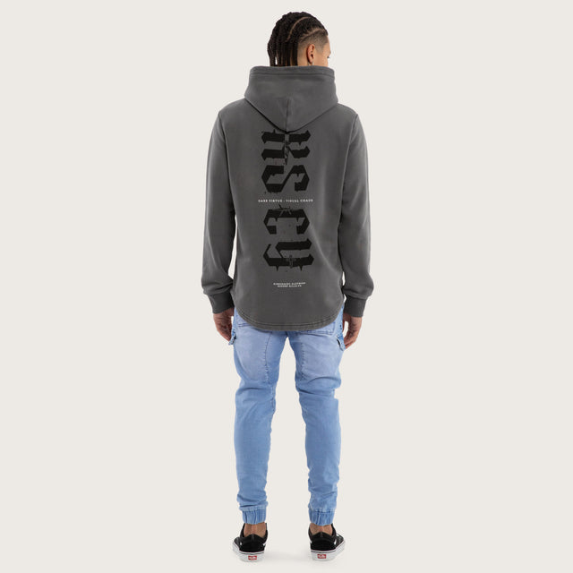 Model wears Existence Dual Curved Hoodie Pigment Charcoal Hoodies in Grey - Image 4