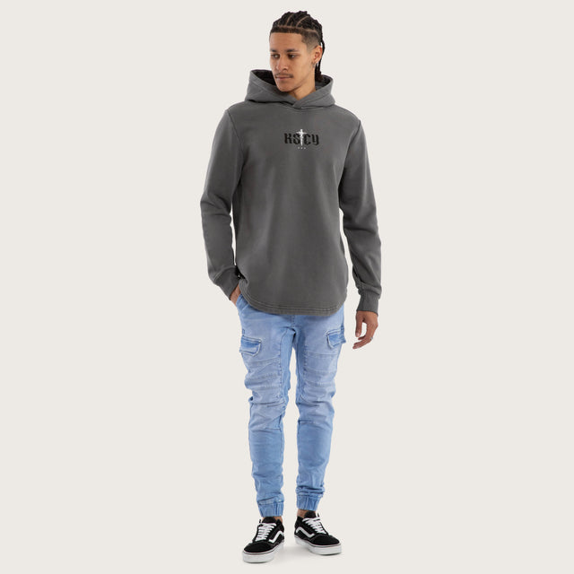 Model wears Existence Dual Curved Hoodie Pigment Charcoal Hoodies in Grey - Image 5
