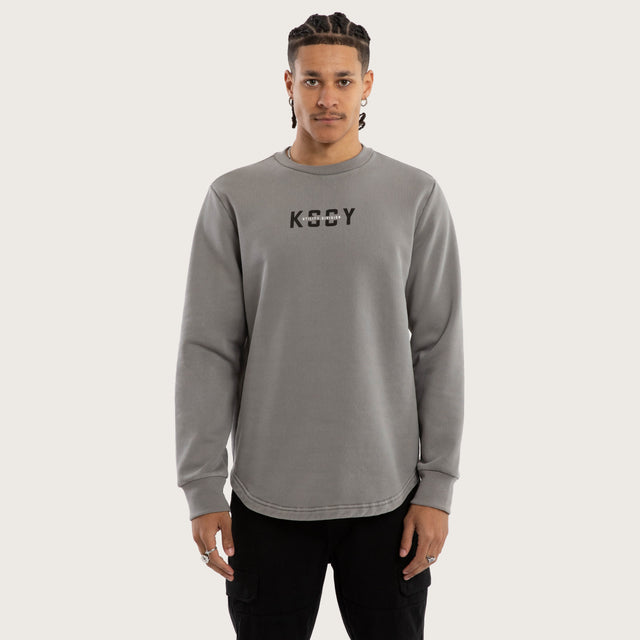 Model wears Griffith Curved Hem Sweater Grey Jumpers in Grey - Image 2