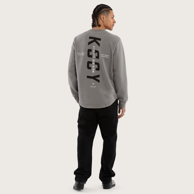 Model wears Griffith Curved Hem Sweater Grey Jumpers in Grey - Image 4