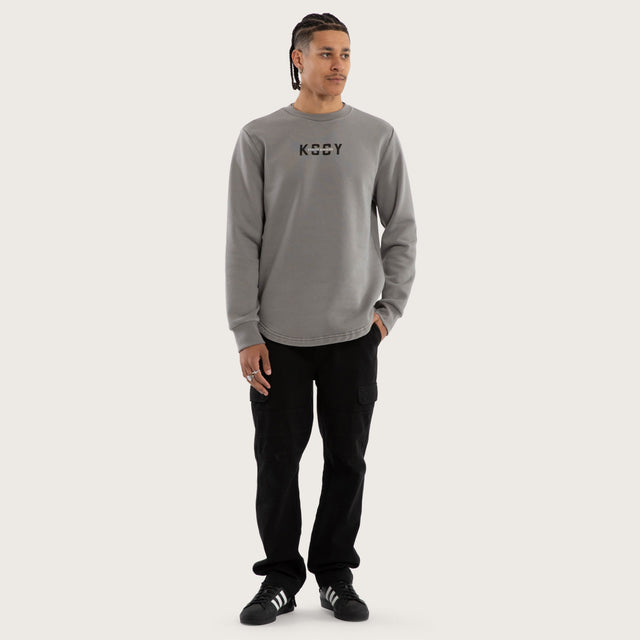 Model wears Griffith Curved Hem Sweater Grey Jumpers in Grey - Image 5