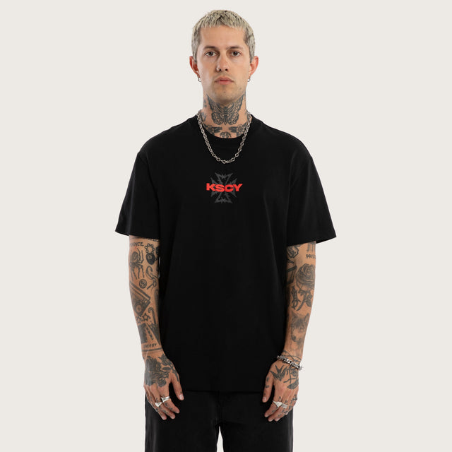 Model wears Pendulum Relaxed Tee Jet Black T-Shirts in Black - Image 1