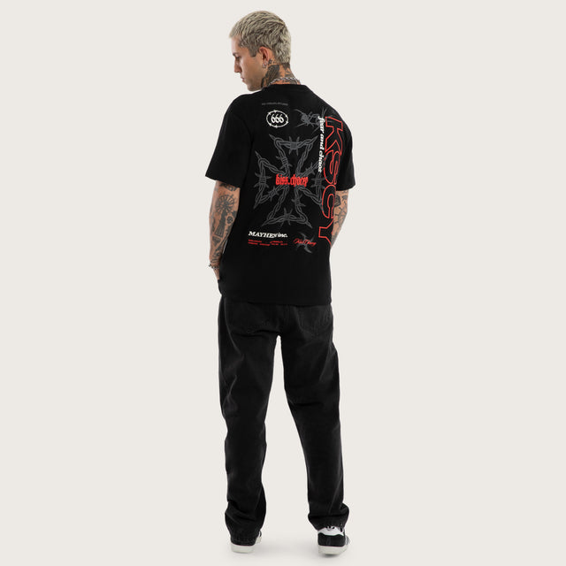 Model wears Pendulum Relaxed Tee Jet Black T-Shirts in Black - Image 4