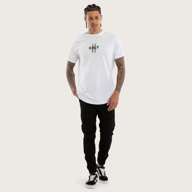 Model wears Inferno Curved Hem Tee Optical White T-Shirts in White - Image 5