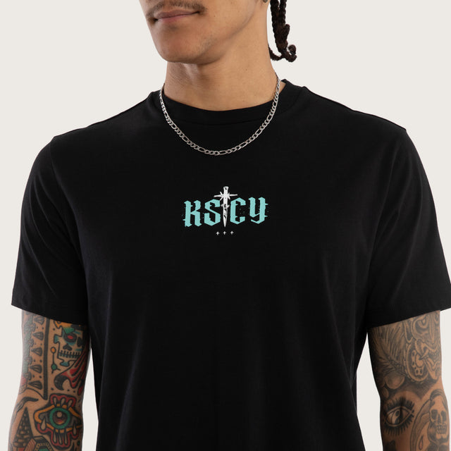 Model wears Exist Curved Hem Tee Jet Black T-Shirts in Black - Image 3
