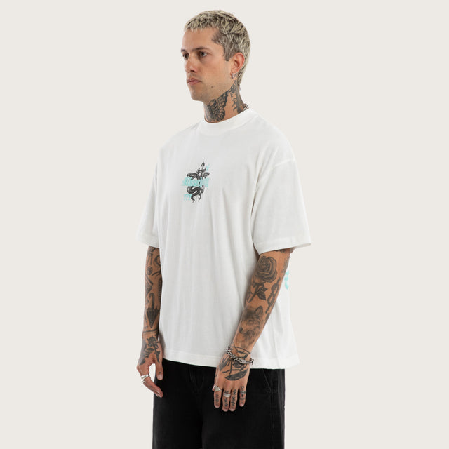 Model wears Despair Street Tee Natural White T-Shirts in White - Image 3