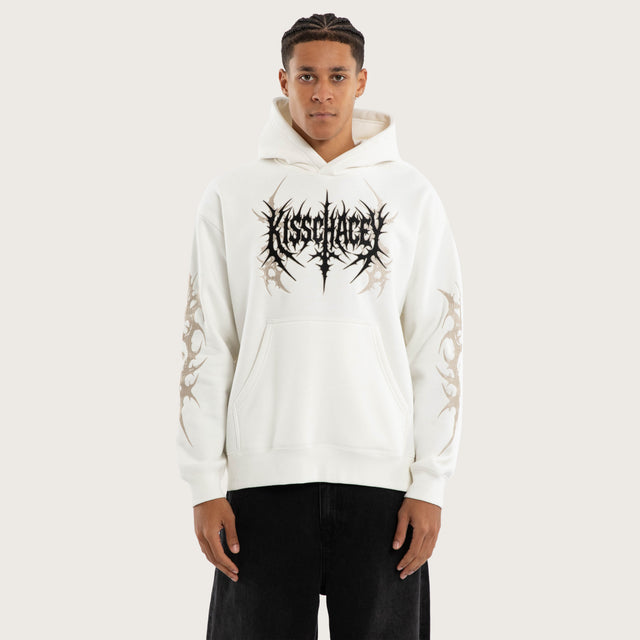 Model wears Cryptic Relaxed Hoodie Natural White Hoodies in White - Image 1