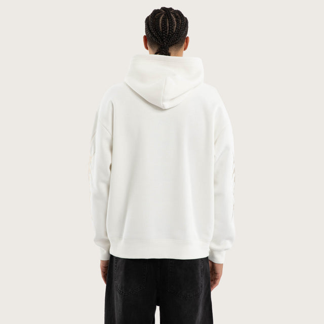 Model wears Cryptic Relaxed Hoodie Natural White Hoodies in White - Image 3