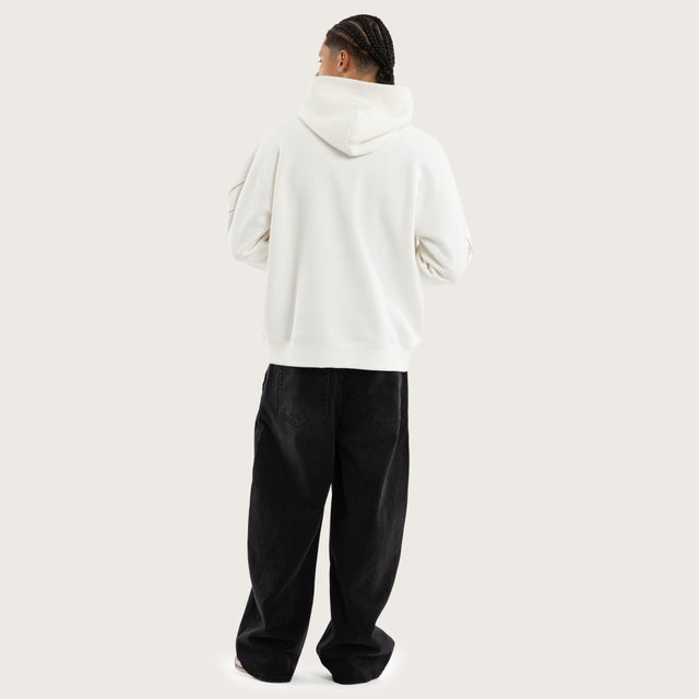 Model wears Cryptic Relaxed Hoodie Natural White Hoodies in White - Image 4