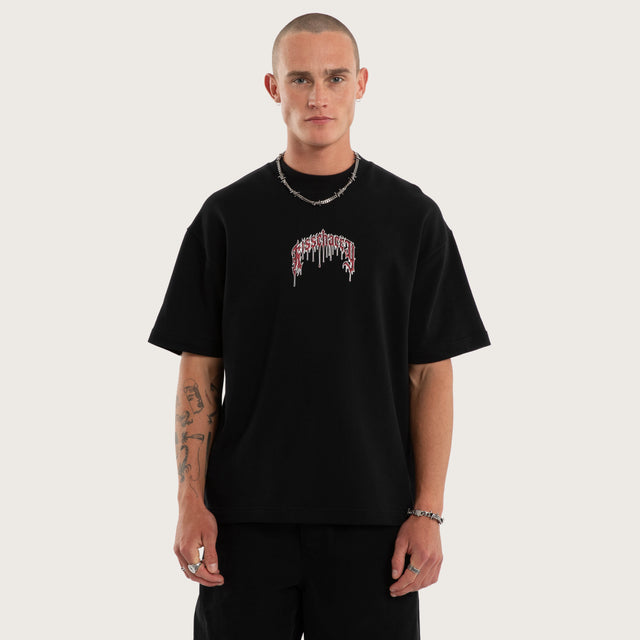 Model wears Glacial Loopback Street Tee Jet Black T-Shirts Black – image 2