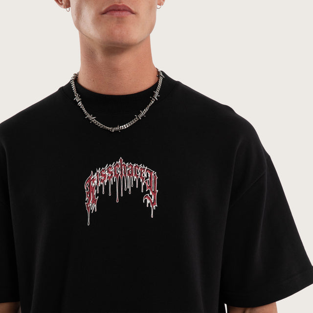 Model wears Glacial Loopback Street Tee Jet Black T-Shirts Black – image 3