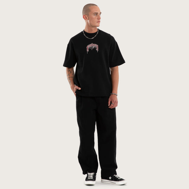 Model wears Glacial Loopback Street Tee Jet Black T-Shirts Black – image 5