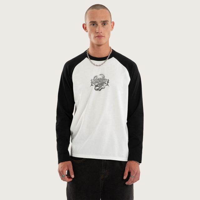 Model wears Scenic Raglan Crew Longsleeve Tee White and Jet Black Longsleeve T-Shirts Black – image 1
