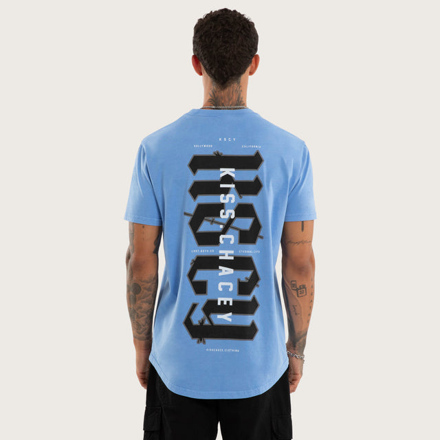 Model wears Severance Dual Curved Tee Pigment Corn Flower T-Shirts Blue – image 1