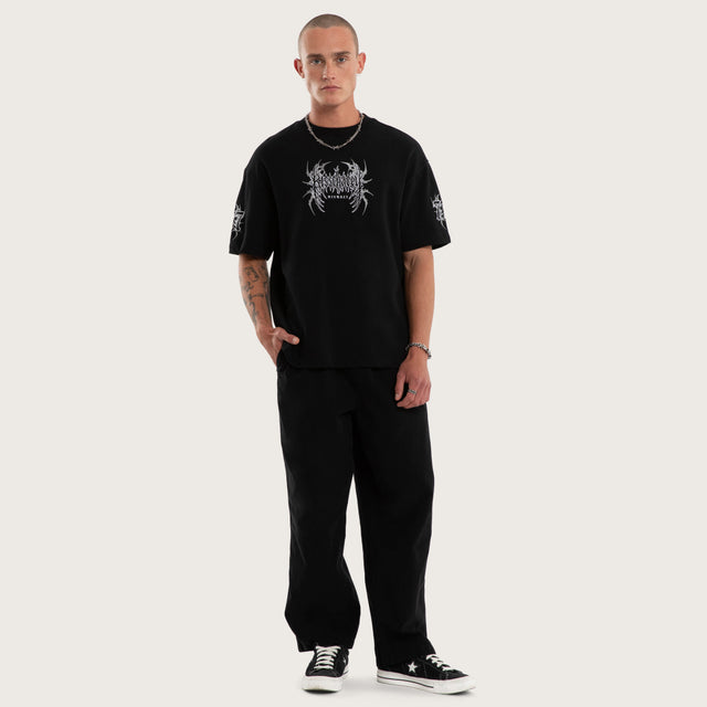 Model wears Threshold Loopback Street Tee Jet Black T-Shirts Black – image 7