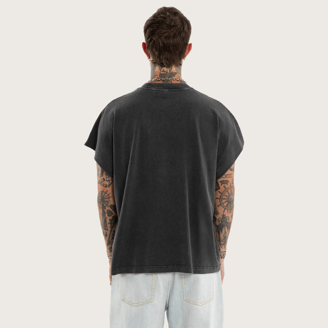 Model wears Norse Cut Off Muscle Mineral Snow Black Muscle Tees Black – image 3