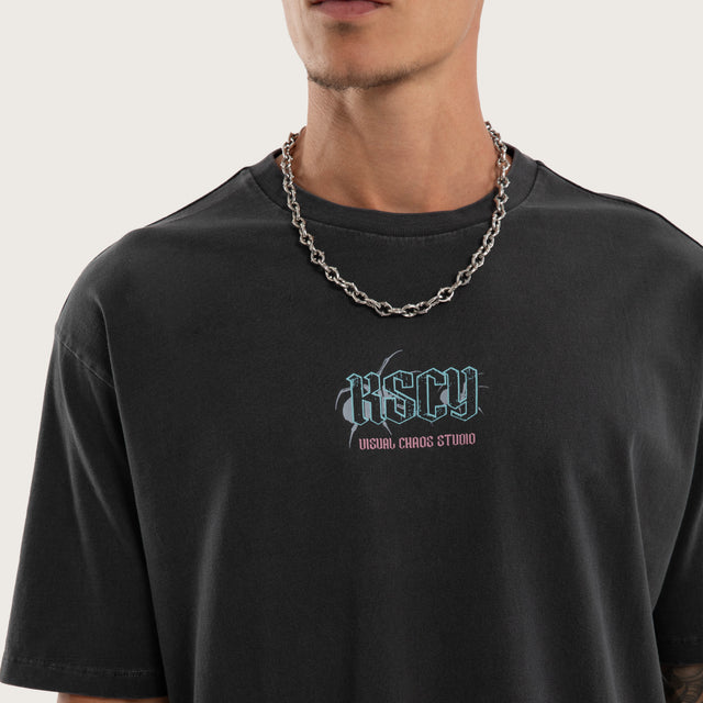 Model wears Wither Box Fit Tee Pigment Black T-Shirts in Black - Image 3