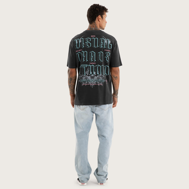 Model wears Wither Box Fit Tee Pigment Black T-Shirts in Black - Image 4
