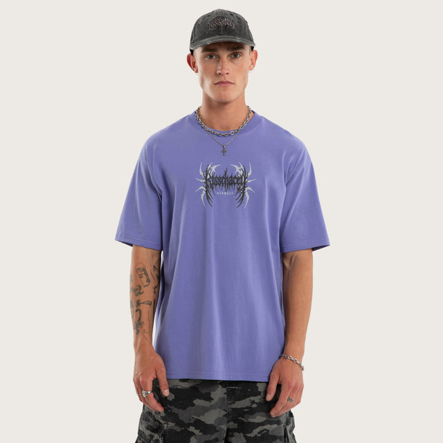 Model wears Conviction Box Fit Tee Purple T-Shirts in Purple - Image 1