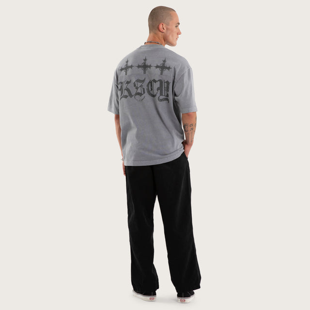 Model wears Forsaken Oversized Tee Grey T-Shirts in Grey - Image 4