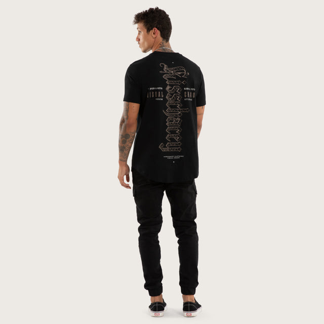 Model wears Recoil Curved Hem Tee Black T-Shirts in Black - Image 4