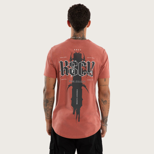Model wears Exhale Curved Hem Tee Red T-Shirts in Red - Image 2