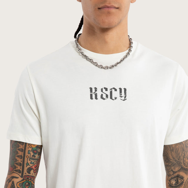 Model wears Citadel Curve Hem Tee White T-Shirts in White - Image 3
