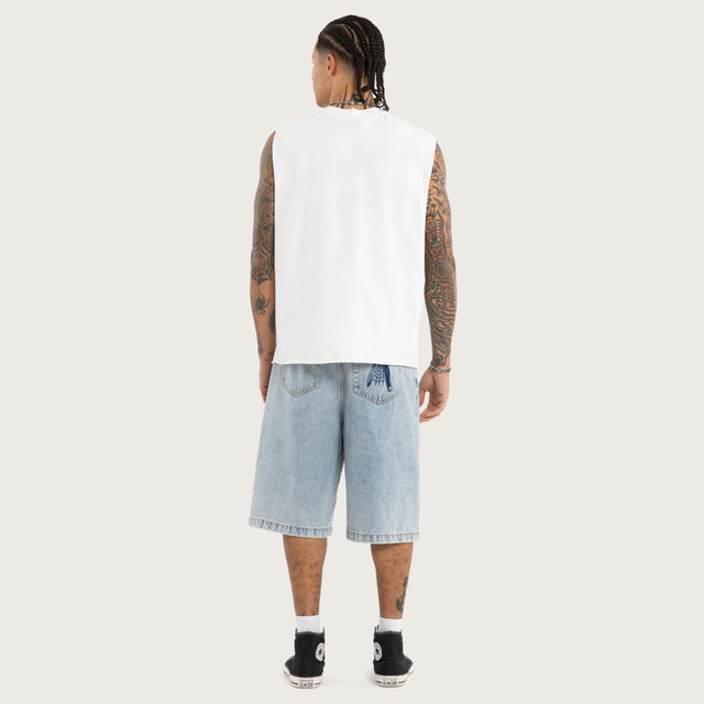 Model wears Darkness Mechanic Muscle Tee White Muscle Tees in White - Image 4
