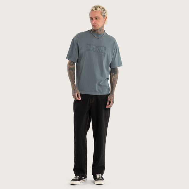 Model wears Oblivion Street Tee Pigment Stormy Weather T-Shirts Blue – image 7