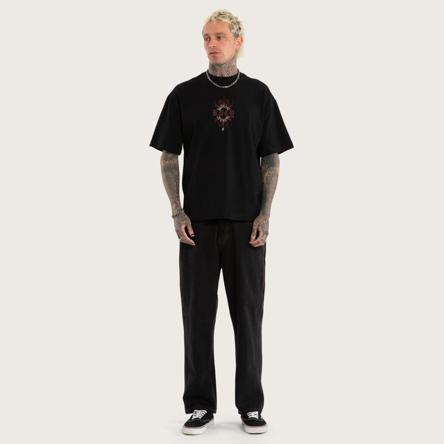 Model wears Luke Walker Code Street Tee Jet Black T-Shirts in Black - Image 6