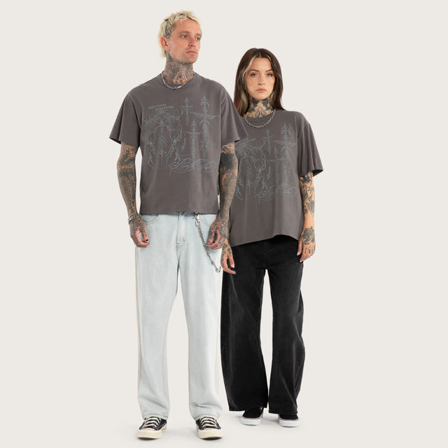 Model wears Luke Walker Error Rocker Tee Charcoal T-Shirts in Grey - Image 4