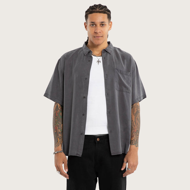 Model wears Acid Charcoal Short Sleeve Shirt Grey Short Sleeve Shirts in Grey - Image 1