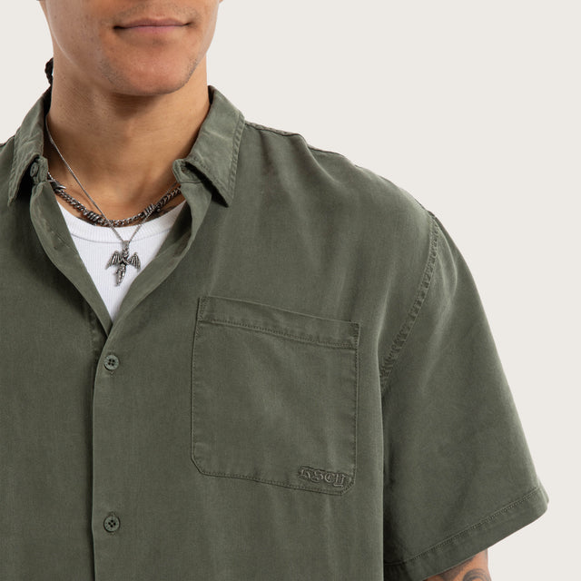 Model wears Acid Sage Short Sleeve Shirt Green Short Sleeve Shirts in Green - Image 2