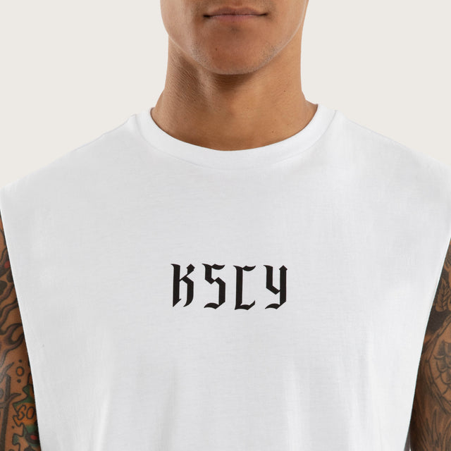 Model wears Sonic Curved Hem Muscle Tee White Muscle Tees in White - Image 4