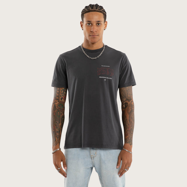 Model wears Heavens Standard Tee Pigment Black T-Shirts in Black - Image 1