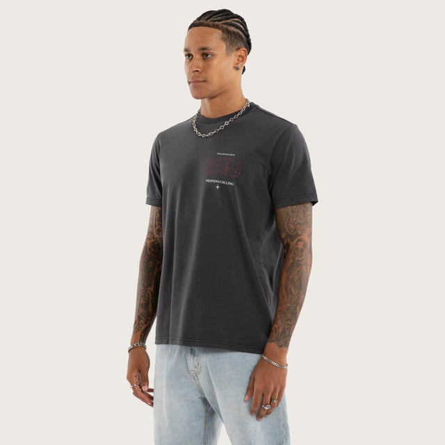 Model wears Heavens Standard Tee Pigment Black T-Shirts in Black - Image 3