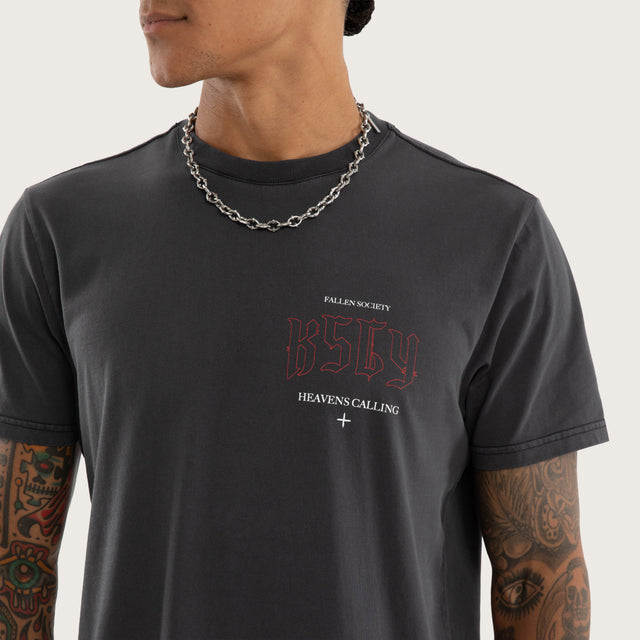 Model wears Heavens Standard Tee Pigment Black T-Shirts in Black - Image 4