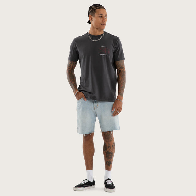 Model wears Heavens Standard Tee Pigment Black T-Shirts in Black - Image 6
