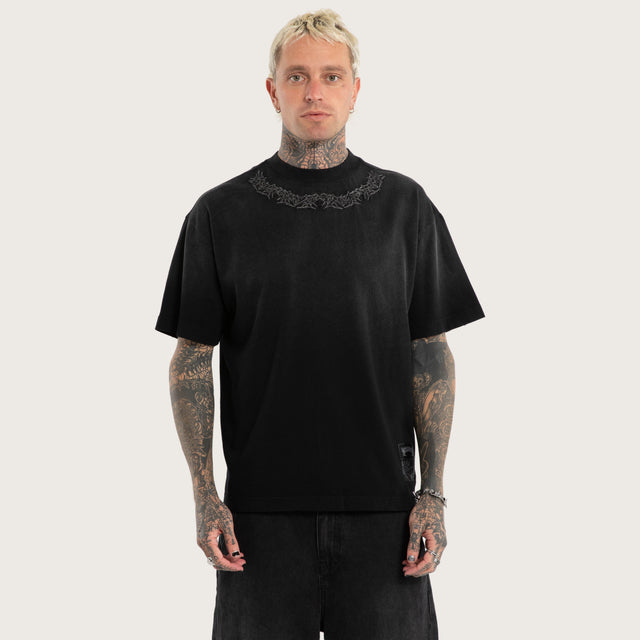 Model wears Ruins Street Tee Sunbleached Black T-Shirts in Grey - Image 1