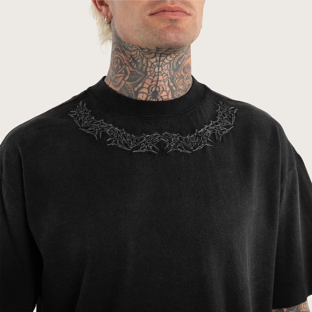 Model wears Ruins Street Tee Sunbleached Black T-Shirts in Grey - Image 4