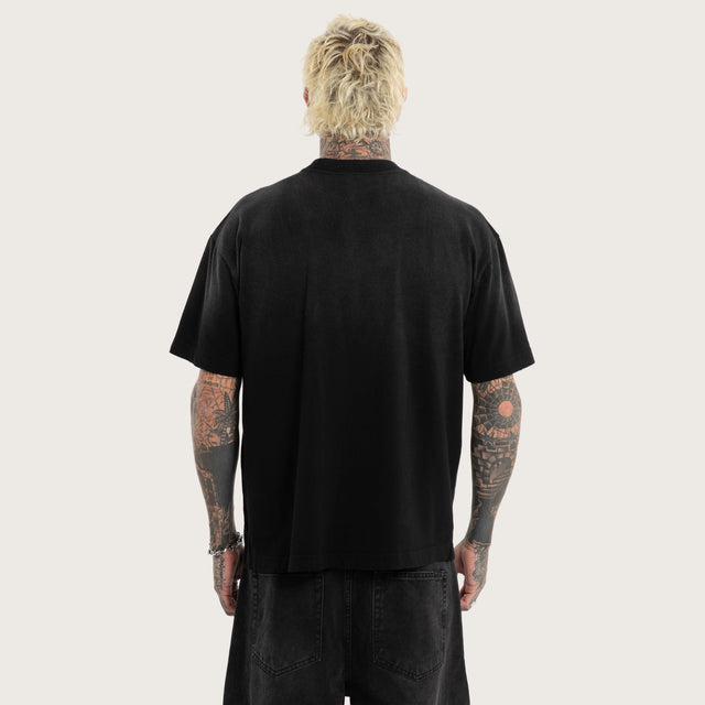 Model wears Ruins Street Tee Sunbleached Black T-Shirts in Grey - Image 3